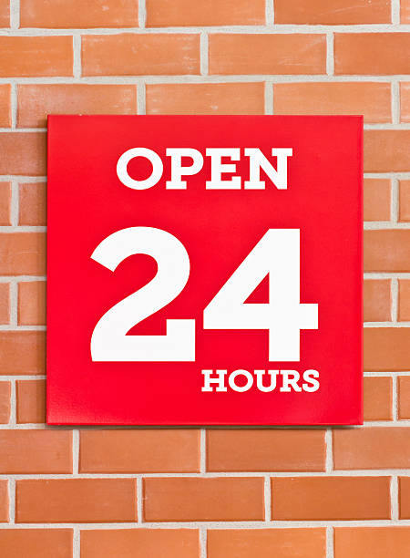 istock 24 hours red signboard on brick background. 175950262