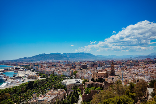 Panorama of Malaga downtown and city Cathedral of Roman Catholic church, view from castle hill Andalusia in southern Spain