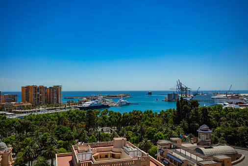 Cityscape panorama of Malaga city hall and port harbor view from above