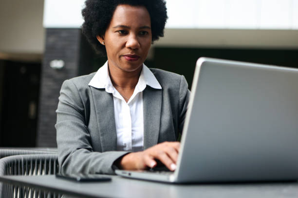 istock Businesswoman typing on a laptop 1759516490