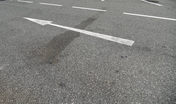 istock Directional arrow on the asphalt 1759518618