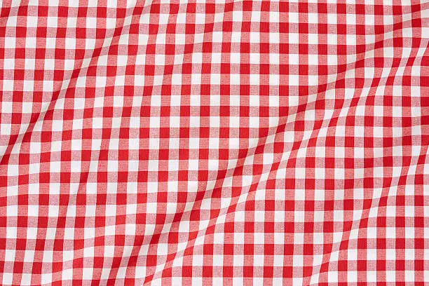 Red and white gingham tablecloth texture background, high detailed.