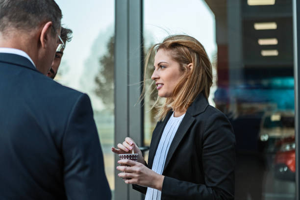 istock Colleagues Enjoy Coffee and Conversations 1759556776