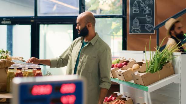 istock Man examining organic pantry supplies 1759557874