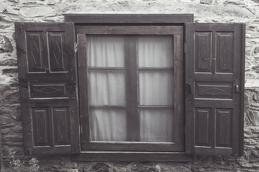 Wooden window of an old house in irice