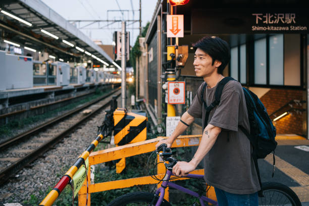 Photo session on young male commuter with bike in Tokyo ShimoKitazawa.