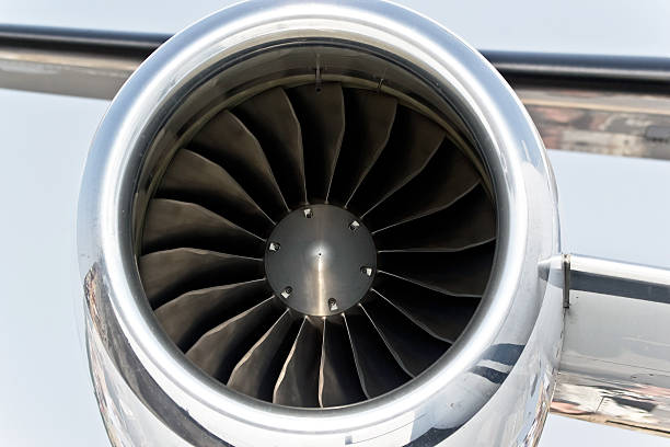 close up of aircraft jet engine travel time stock photo