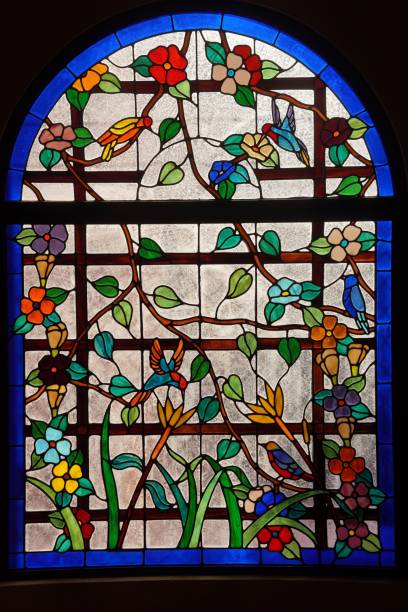 istock a stained window in the wall with birds and flowers on it 1759608778