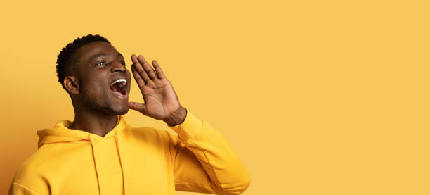istock Handsome african american guy shouting towards copy space 1759616719