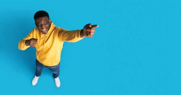 istock Top view of black man pointing at copy space 1759617771
