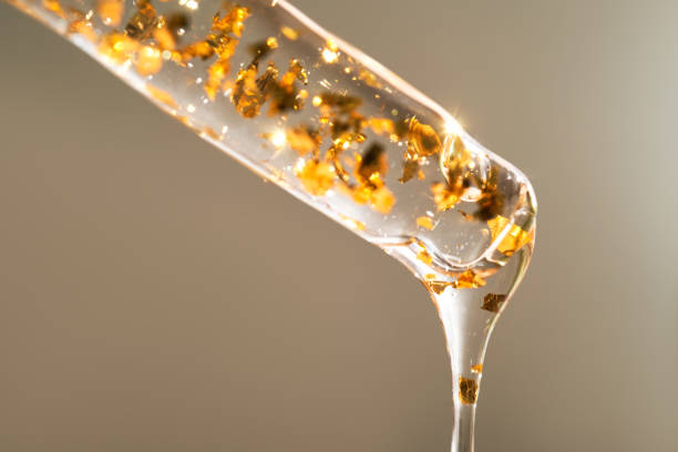 istock Serum pipette with 24K Gold particles. 1759622245