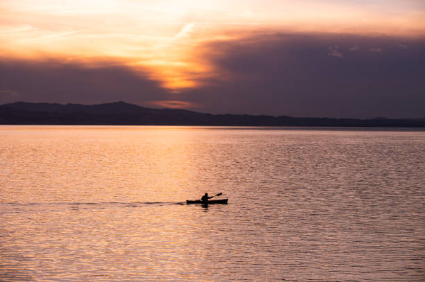 istock Kayak silhouette on Lake Constance sunset 1759622827