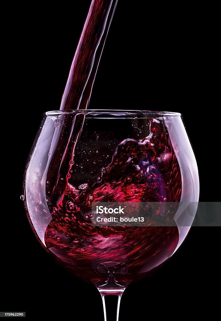 Elegant red wine glass in black background Elegant red wine glass  in black background Alcohol - Drink Stock Photo