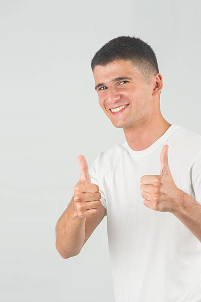 istock Happy teenager with two thumbs up 175962389