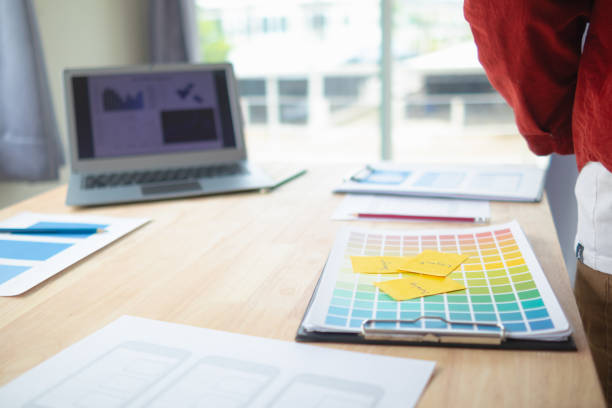 The designer team is designing the uxui system to make the uxui system work well on new phones and support system updates. Website development concept UI UX front end designer