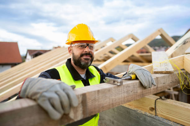 istock Caucasian male roofer, working on a roof beam on a construction site 1759631036
