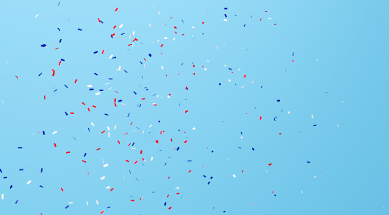 Square shaped paper confetti falling over blue background.