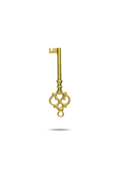 istock vintage golden skeleton keys isolated on white background with clipping path. 1759647337