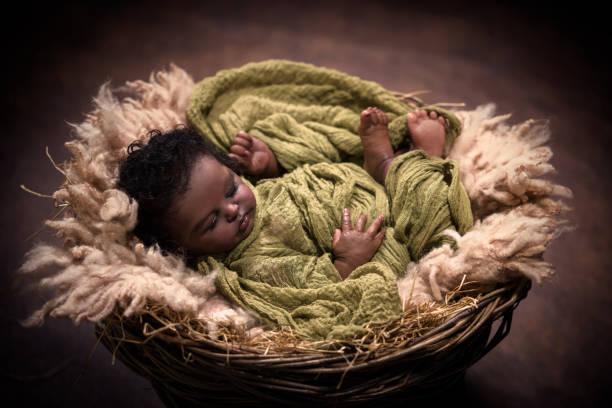 istock African baby sleeping in Christmas Nativity scene 1759711086
