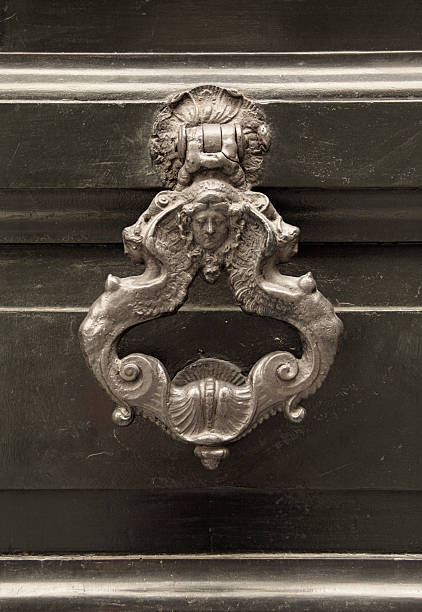 istock Antique knocker on a door 175973695