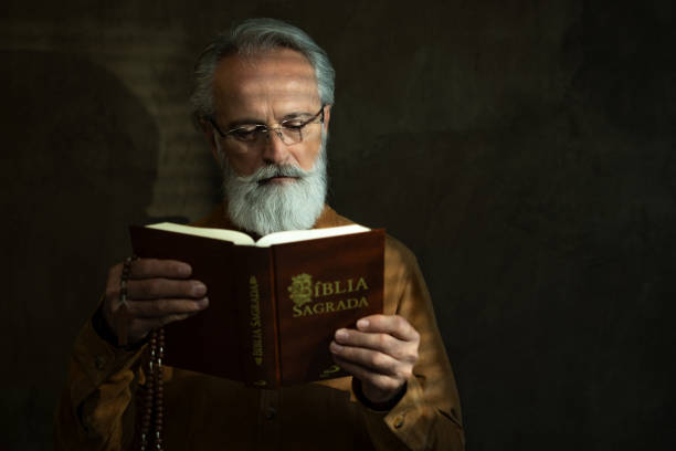 istock Senior man with Holy Bible 1759749420
