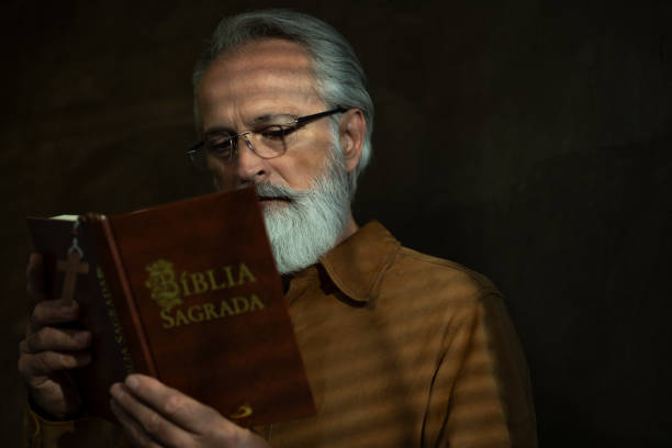 istock Senior man with Holy Bible 1759750064