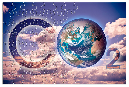 Jigsaw puzzle pieces textured with European Union and Maltese flags on white. Horizontal composition with copy space. Clipping path is included.