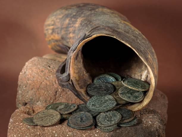 istock Roman coins coming out of a cornucopia. 1759783649