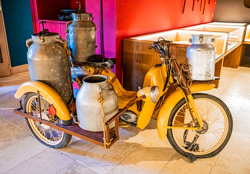 Old motor milk tricycle  in the showroom of Tenuta Vanilla