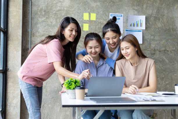 istock Colleagues meeting to discuss work plan on laptop in office. Group of university students working together in the library. 1759832575