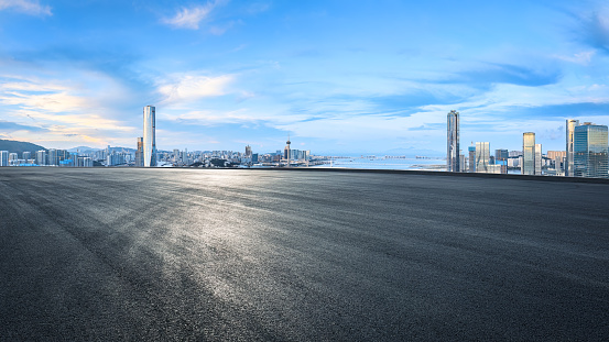 Clean asphalt road and city skyline in Macau island