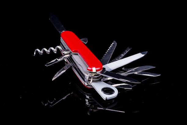istock Swiss knife on black background 175985743