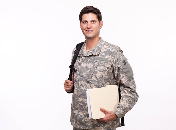istock Portrait of a soldier with backpack and documents 175987933