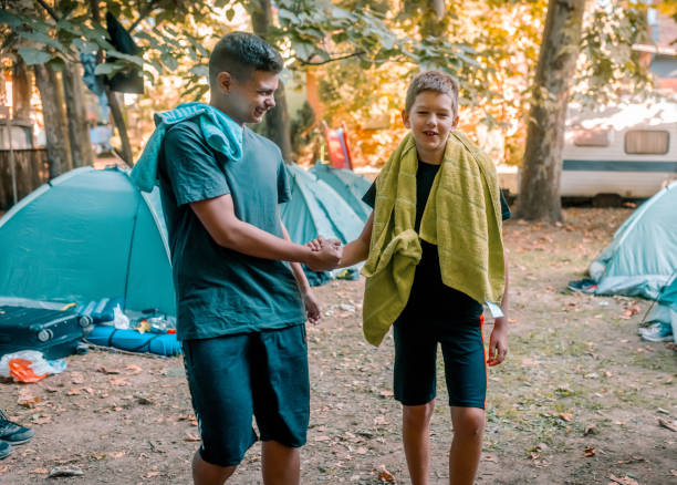 istock friends spend time in a camp in nature 1759889972