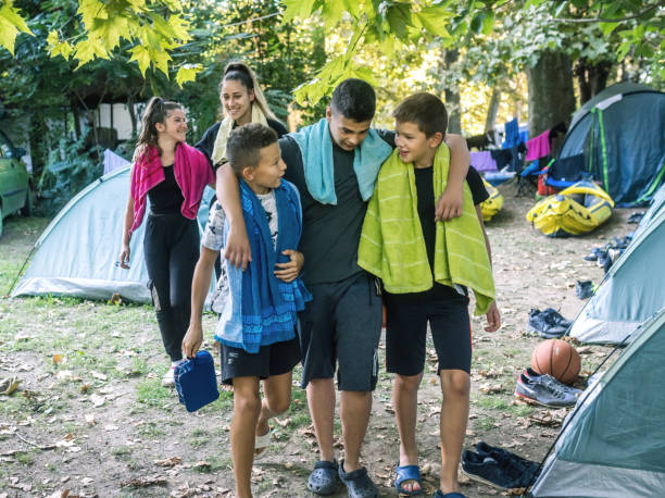istock friends spend time in a camp in nature 1759894262