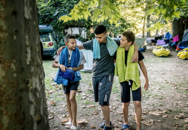 istock friends spend time in a camp in nature 1759895402