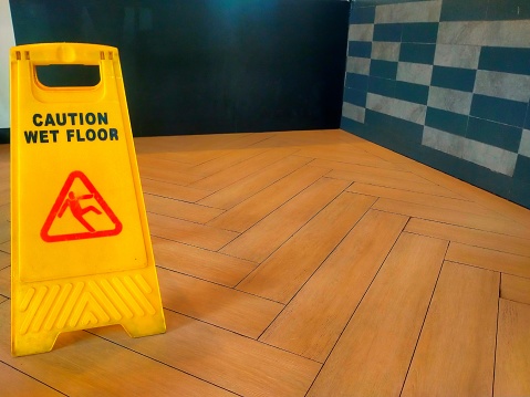 Warning signs for wet floors in restaurants