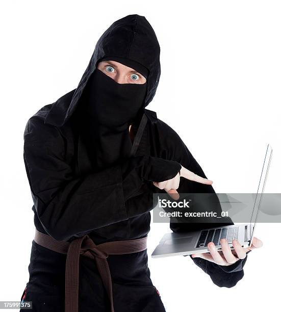 Foto de Homem Caucasiano Pretexto De Um Ninja Isolada No Branco e mais fotos de stock de Adulto