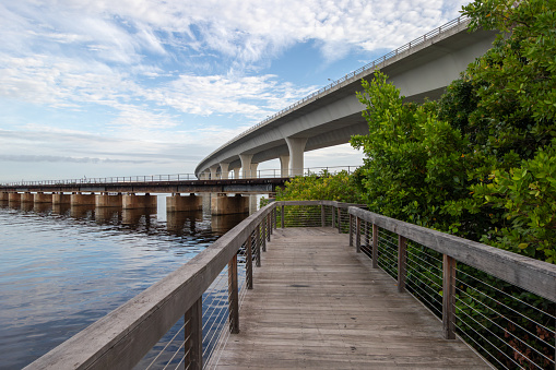 Historic Riverwalk in Stuart, Florida takes you along the St. Lucie River under the Roosevelt Bridge