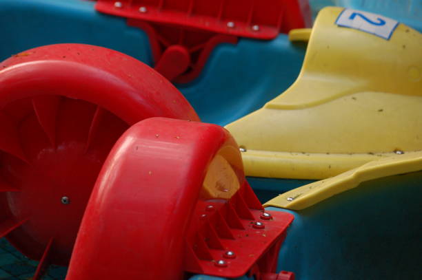 Yellow, red, and blue duck boat parts