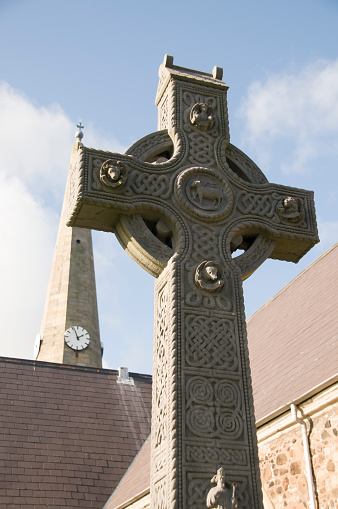 Celtic cross at Cill Chriosd / Kilchrist Church graveyard, former parish church of Strathaird against white background, Isle of Skye, Highlands, UK