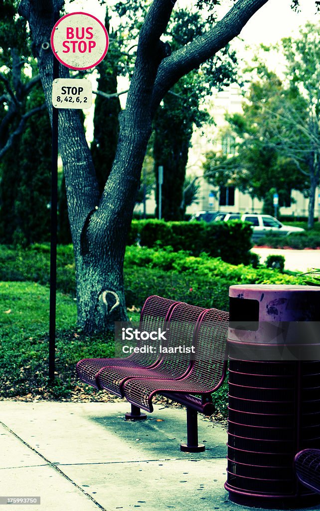 Bus Stop 1 (colored) A bus stop with some urban type coloring added to it. Focus on trash can and bench. Accuracy Stock Photo