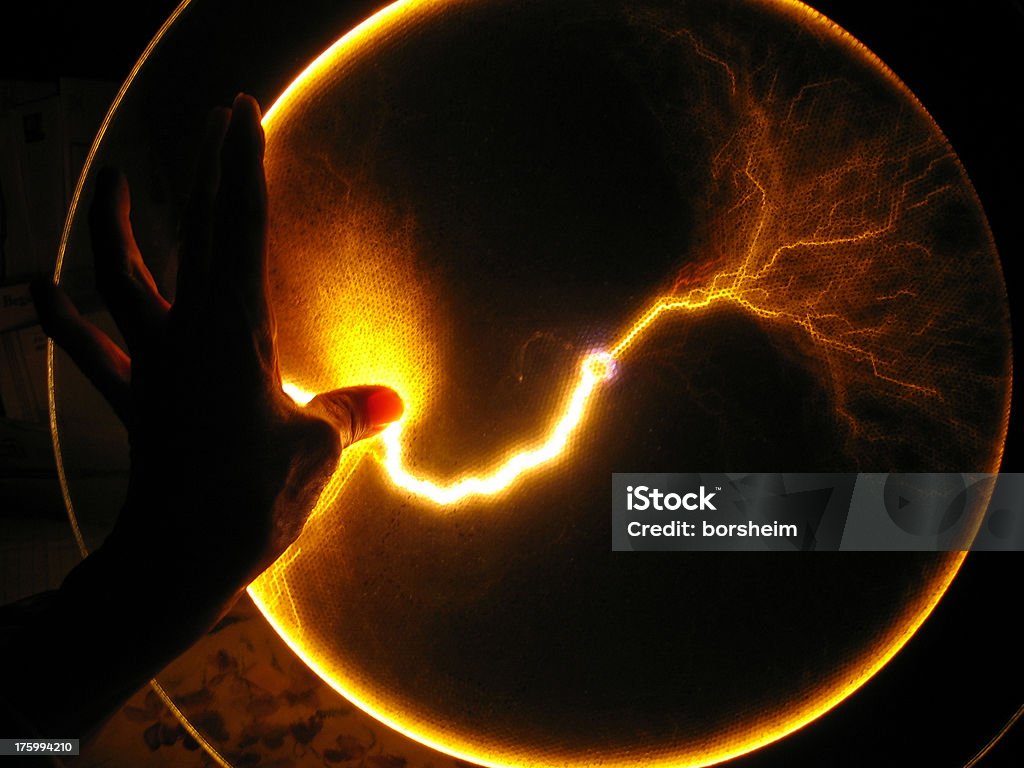 Finger Jolt III A 70-year-old woman's long slender fingers and thumb create a jolt of lightning that reaches out horizontally. Unity Stock Photo