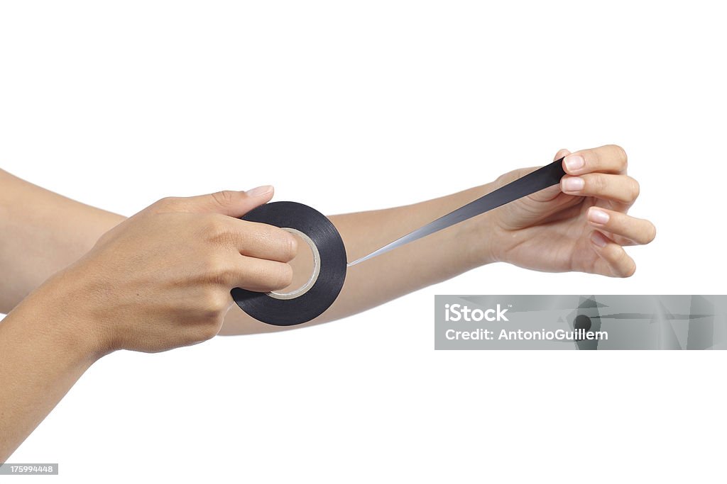 女性の手を保持し、絶縁テープ - 粘着テープのロイヤリティフリーストックフォト