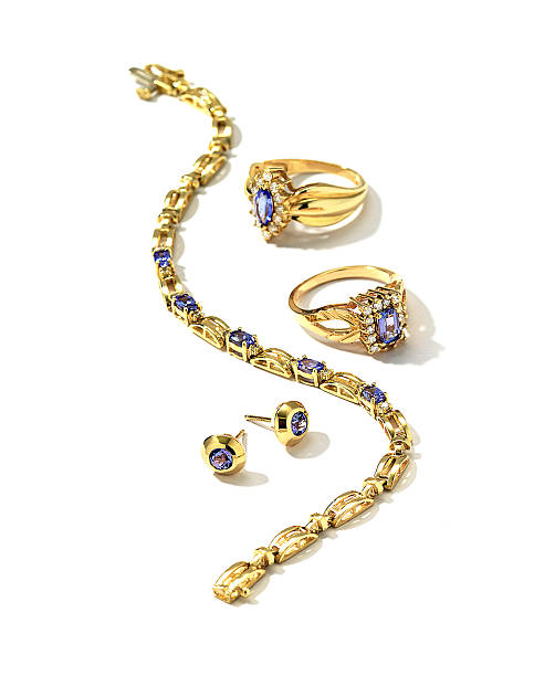 deep blue bracciale con anelli e orecchini - gold jewelry earring bracelet foto e immagini stock