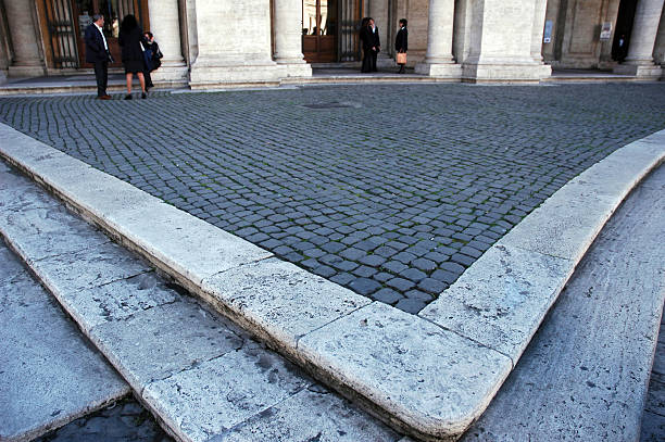 Piazza di Spagna in Rome with few people on a sunny day in Italy, after the Italian government loosened quarantine measures for Covid-19 virus. (Rome, may 5 2020)