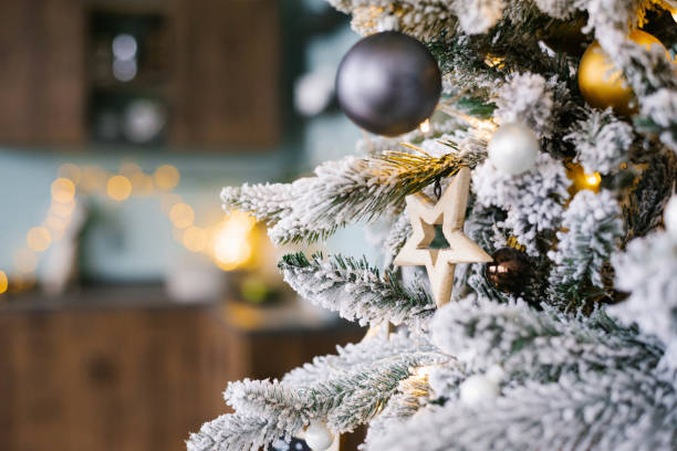 istock Christmas wooden star toy on Christmas tree with copy space 1759965062