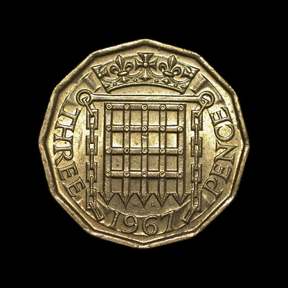 Last year of issue for this English dodecagon (twelve-sided) coin, the 'thripenny bit', out of circulation since metrication of British money in 1971.  In old money, the threepenny bit was a quarter of a shilling. Nowadays it would be worth just over 1p (one pence).