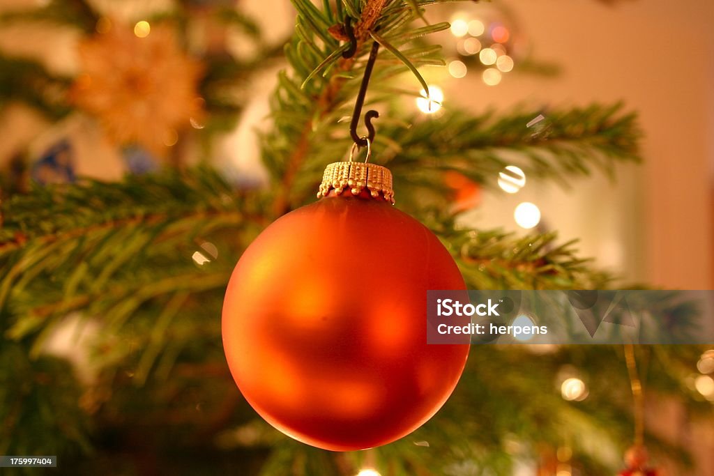 Beautiful glitter ball / bauble Christmas mood in the tree. Red glitter ball of christmas decoration and ornament. Bauble in the center.Need more christmas decoration Advent Stock Photo
