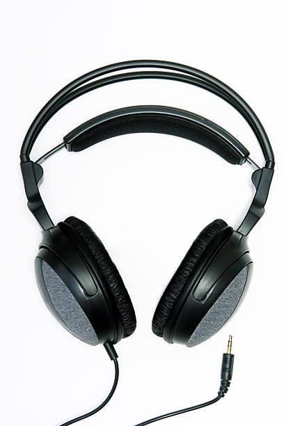 Headphones in High Key "A pair of professional-quality headphones, high-key, on white.Check out my other" high fidelity stock pictures, royalty-free photos & images